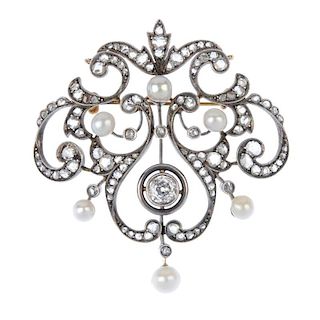 A late 19th century silver and gold diamond, pearl and cultured pearl pendant. The natural pearls, m