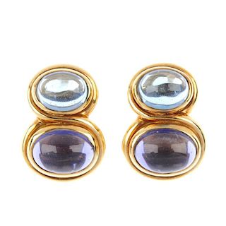 BULGARI - a pair of gem-set earrings. Each designed as an oval iolite cabochon and graduated oval bl