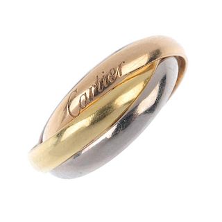 CARTIER - an 18ct gold 'Trinity' ring. Of tri-colour design, comprising three interwoven bands. Sign