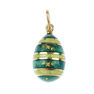 FABERGE - an 18ct gold enamel egg pendant. Designed as a series of green guilloche enamel bands, wit
