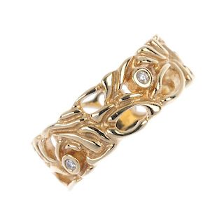 PANDORA - a 14ct gold diamond band ring. Of openwork foliate design, with brilliant-cut diamond coll