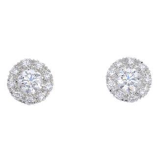 THEO FENNELL - a pair of diamond cluster ear studs. The brilliant-cut diamond within a similarly-cut
