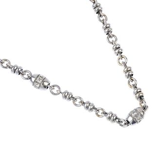 THEO FENNELL - an 18ct gold diamond necklace. Designed as a series of brilliant-cut diamond barrel-s