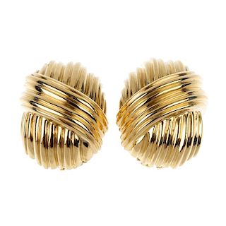 TIFFANY & CO. - a pair of 1970s ear clips. Each designed as a grooved crossover panel. Signed Tiffan