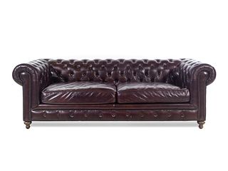 A Contemporary Tufted-Leather Upholstered Chesterfield Sofa