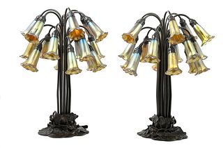 A Pair of Art Nouveau Style Patinated Metal and Iridescent Glass Eighteen-Light Tulip Lamps 