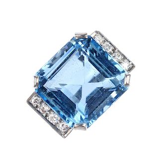 An aquamarine and diamond dress ring. The square-shape aquamarine, to the brilliant-cut diamond line
