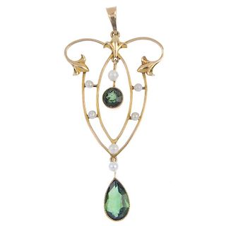 An early 20th century 9ct gold tourmaline and seed pearl pendant. Of openwork design, the pear-shape