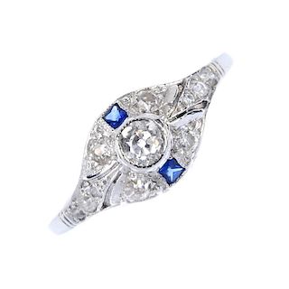A diamond and sapphire dress ring. The old-cut diamond collet, within a similarly-set diamond and sq
