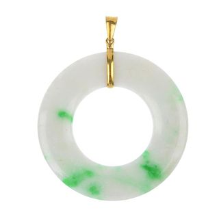 A jade pendant. The jadeite pi, suspended from a tapered surmount. Length 7cms. Weight 22.9gms. Jade
