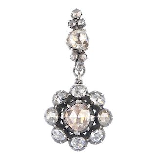 A diamond pendant. The foil back rose-cut diamond and similarly-set rose-cut diamond halo, suspended