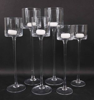 Six Colorless Glass Candle Holders