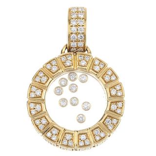 An 18ct gold diamond pendant. Designed as nine free-moving brilliant-cut diamond collets, within a c