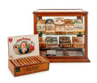 A Collection of Fifteen Tobacco Cartons and a Tobacco Rope in Display Case 