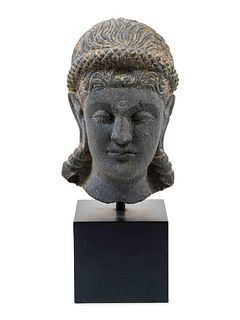 A Life Size Gandharan Grey Schist Head of the Goddess Hariti 