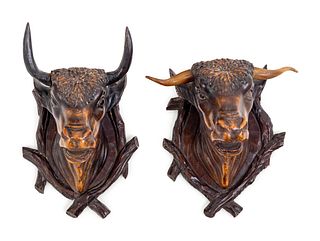 A Pair of Black Forest Carved Wood Bull Wall Mounts