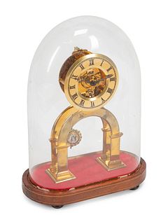 A Continental Gilt Bronze Skeleton Clock and Glass Dome