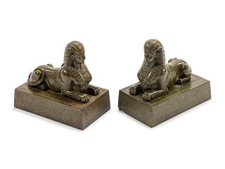 A Pair of Continental Patinated Metal Sphinxes