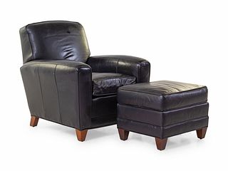 A Modern Leather Upholstered Club Chair and Ottoman
