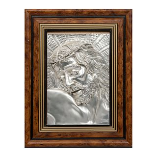 Divino rostro. Italia. Siglo XX. Elaborado en resina moldeada con electrobaño plateado. Enmarcado. 41 x 31 cm