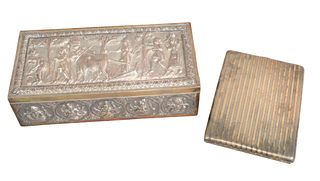 Two Silver Boxes to include a sterling cigarette case marked sterling and 18K made in France, along with a middle eastern silver embossed box, 5.5 t.o