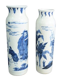 Two Chinese Blue and White Porcelain Sleeve Form Vases each having flared rims, one with a hoofed dragon and incised details, the other with figures i