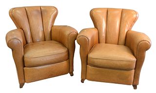 Pair of Leather Upholstered Easy Chairs, height 36 inches, width 36 inches.