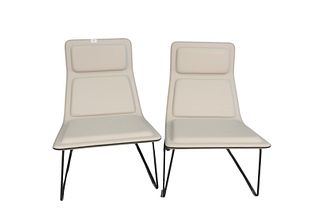 Pair of Jasper Morrison "Low Pad" Chairs, made by Cappellini Millan, grey leather with cushion, height 31 1/2 inches.