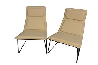 Pair of Jasper Morrison "Low Pad" Chairs, made by Cappellini Millan, tan leather with extra grey leather pad, height 31 1/2 inches.
