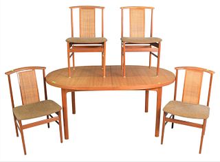 Danish Modern Dining Set, having oval table with four chairs, along with two 18 inch leaves and one 24 inch leaf, 125 inches open, top 42" x 65".