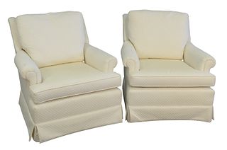 Four Piece Lot, to include pair of upholstered armchairs, along with two near matching ottomans, height 32 inches, width 33 inches.