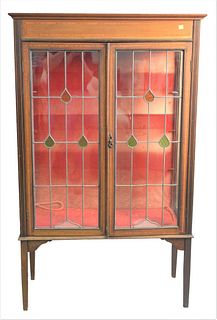 Mahogany China Cabinet, having leaded doors, height 56 inches, width 33 inches, depth 12 1/2 inches.