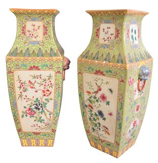 Pair of Square Chinese Famille Rose Vases, having floral decoration, both marked to the underside, height 16 1/4 inches.