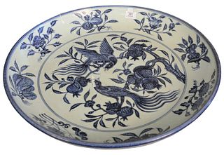 Large Chinese Ming Style Blue and White Porcelain charger with painted bird and pomegranate motif, diameter 23 5/8 inches.