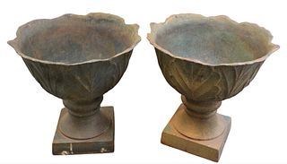 Pair of Cast Iron Outdoor Planters, height 24 inches, diameter 24 inches.