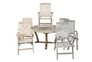 Eight Piece Teak Outdoor Dining Set to include a round table, six folding armchairs and umbrella, (chairs having cushions), height 29 inches, diameter