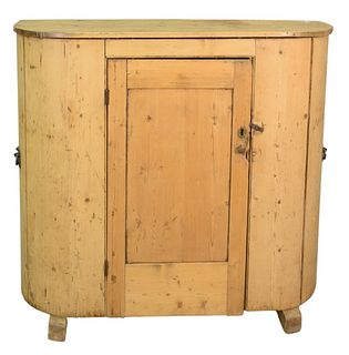 Pine Demilune Cabinet, having one door, height 45 1/2 inches, width 48 1/2 inches, depth 16 inches.