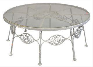 Iron Glass Top Coffee Table, height 17 inches, diameter 41 1/2 inches.