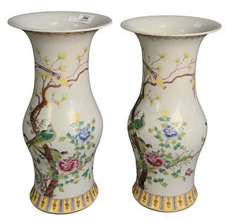 Pair of Chinese Famille Rose Vases having painted birds in a tree decoration, marked with six characters to the underside, height 15 3/4 inches.
