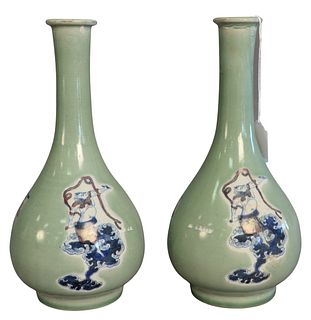 Pair of Chinese Celadon Glazed Bottle Vases having underglazed copper red and blue figures, not marked, height 12 1/4 inches.