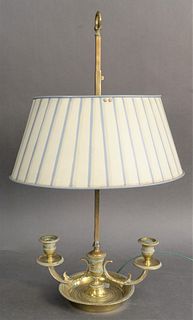 Brass Two-Light Boudoir Lamp, having two candle holders and adjustable shaft, height 22 inches. 
Provenance: The Gloria Schiff Estate, New York, NY.