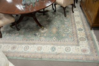 Oriental Carpet, pale green background, 11' 7" x 17' 6".