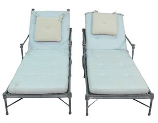 Pair of Restoration Hardware Patio Chaise Lounges with upholstered cushions, length 70 inches, width 27 1/2 inches.