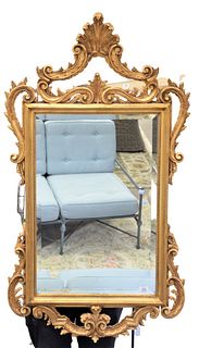 Two Framed Mirrors to include a Chippendale style mirror with gold frame, height 54 inches, width 30 inches, along with a Queen Anne style mirror.