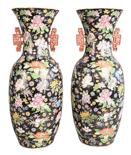 Pair of Chinese Famille Rose Vases having red handles, marked to the underside, height 23 1/4 inches.