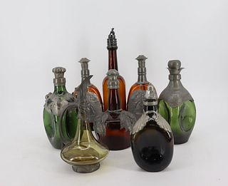 Lot Of 8 Pewter Clad Colored Glass Bottles.