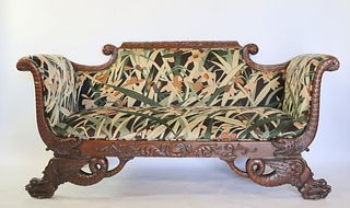 Empire Carved & Upholstered Scroll Arm Sofa.