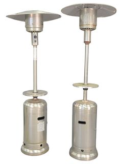 Pair Propane Outdoor Stainless Steel Heaters, height 90 inches.