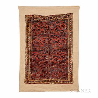 "Cloudband" Beshir Rug, Central Asia, c. 1860, mounted on linen, 5 ft. 3 in. x 3 ft. 7 in.