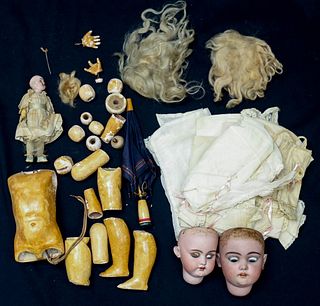 Disassembled Dolls and Clothing